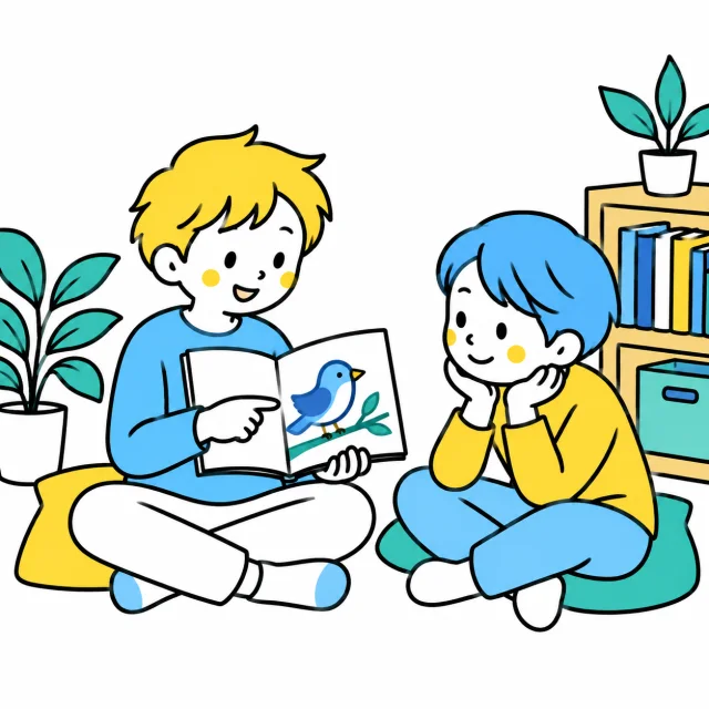 本を持って声で伝える子どもと、向かいで聞く子ども