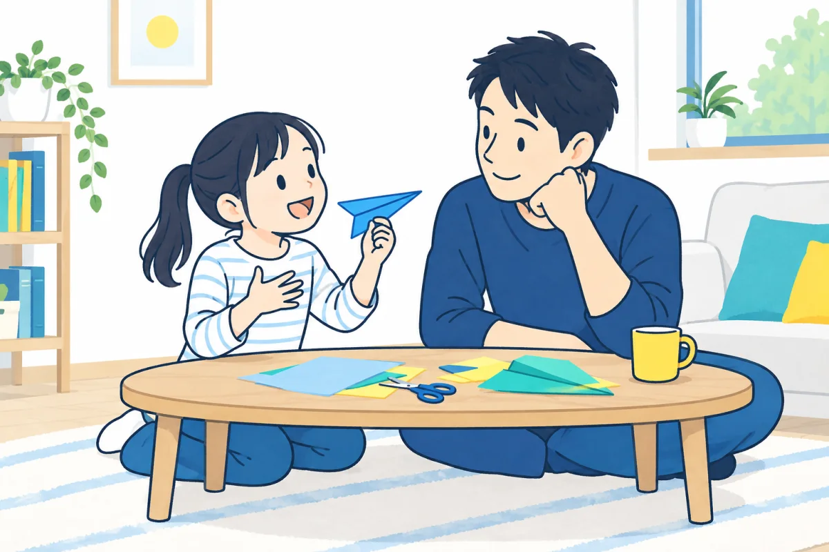 紙飛行機を手に、体験したことを父親へ話す子どものイメージ